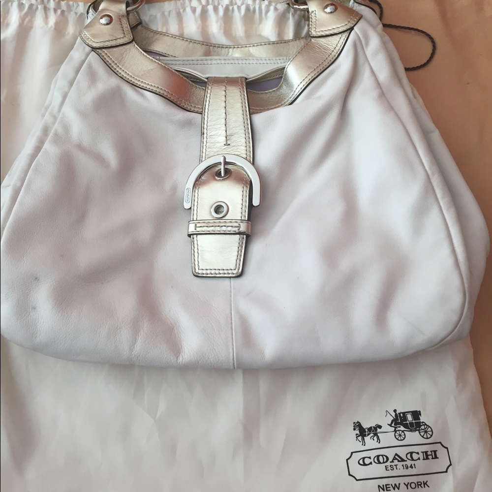 Cream colored Coach bag