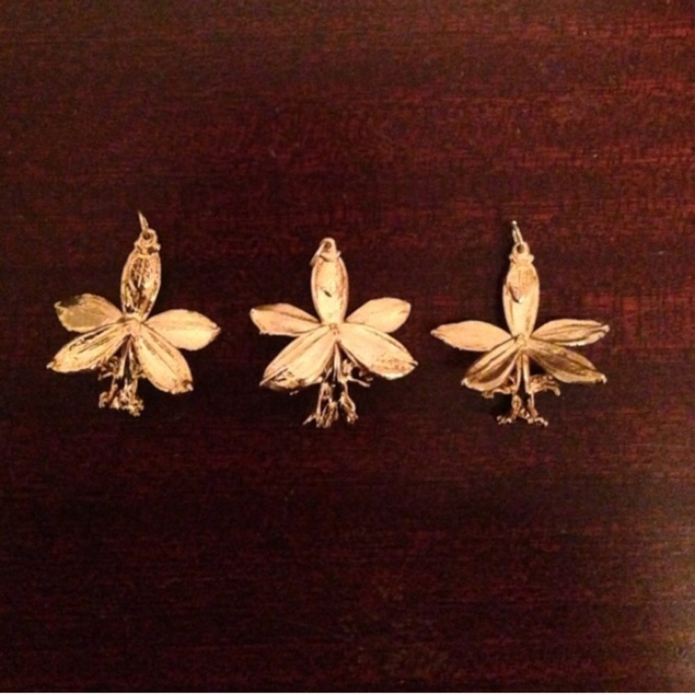 2 gold dipped Hawaiian orchid pendants