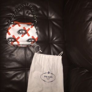 prada eyes bag