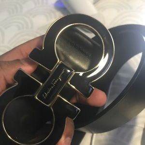 Size 34-38 men Ferragamo ;black and gold accent.