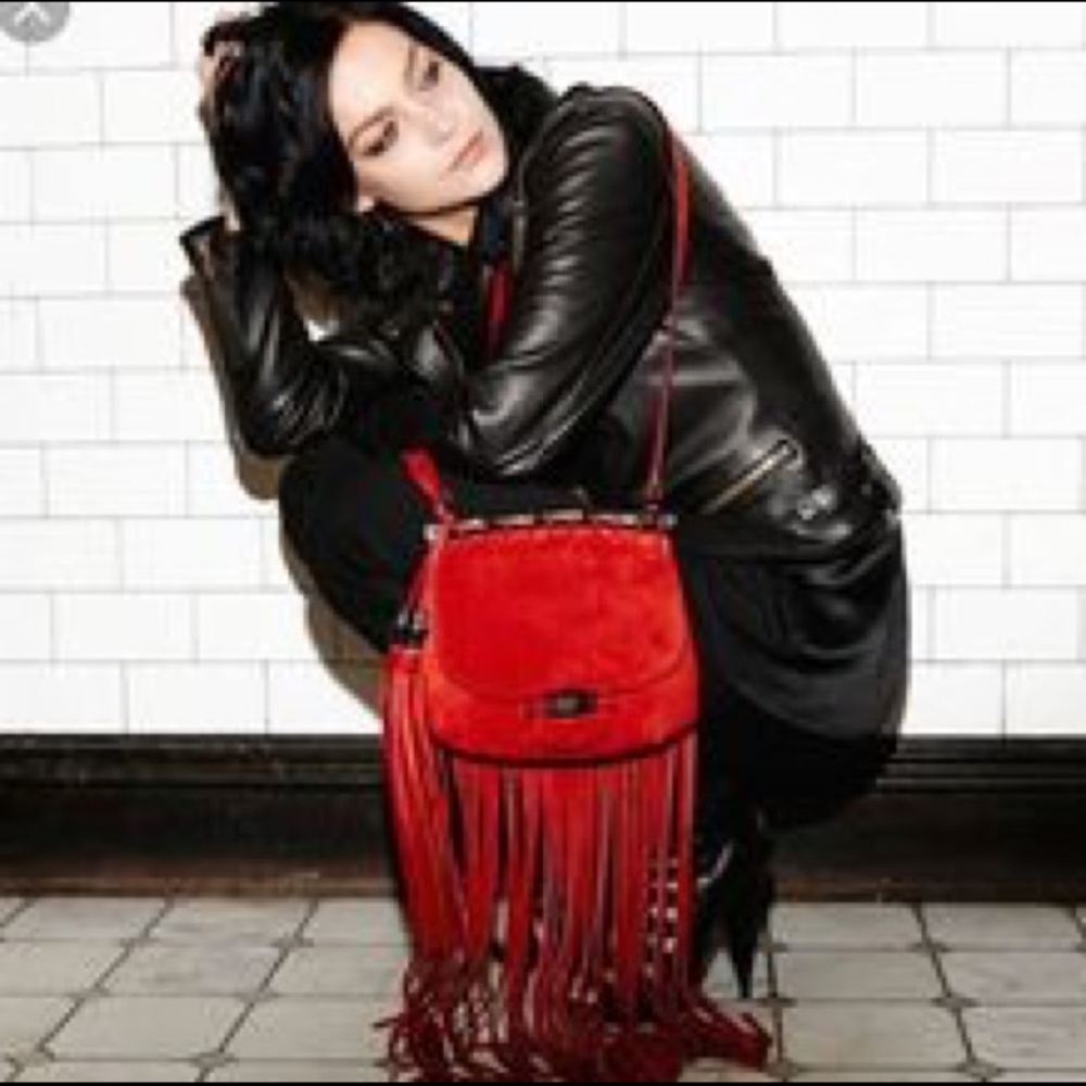 Red suede Gucci fringe bag