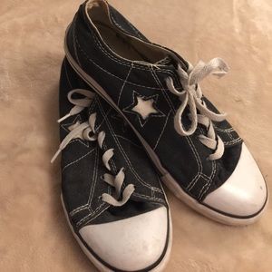 Black and white Converse one star shoes