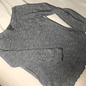 grey long sleeved top