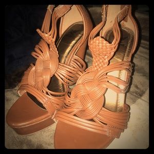 Tan heels zip in the back