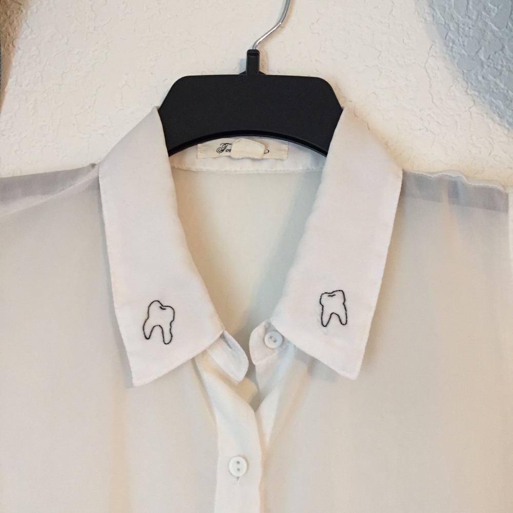 Hand embroidered tooth button up tank top!