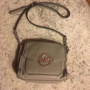 small/medium sized gray Michael Kors purse