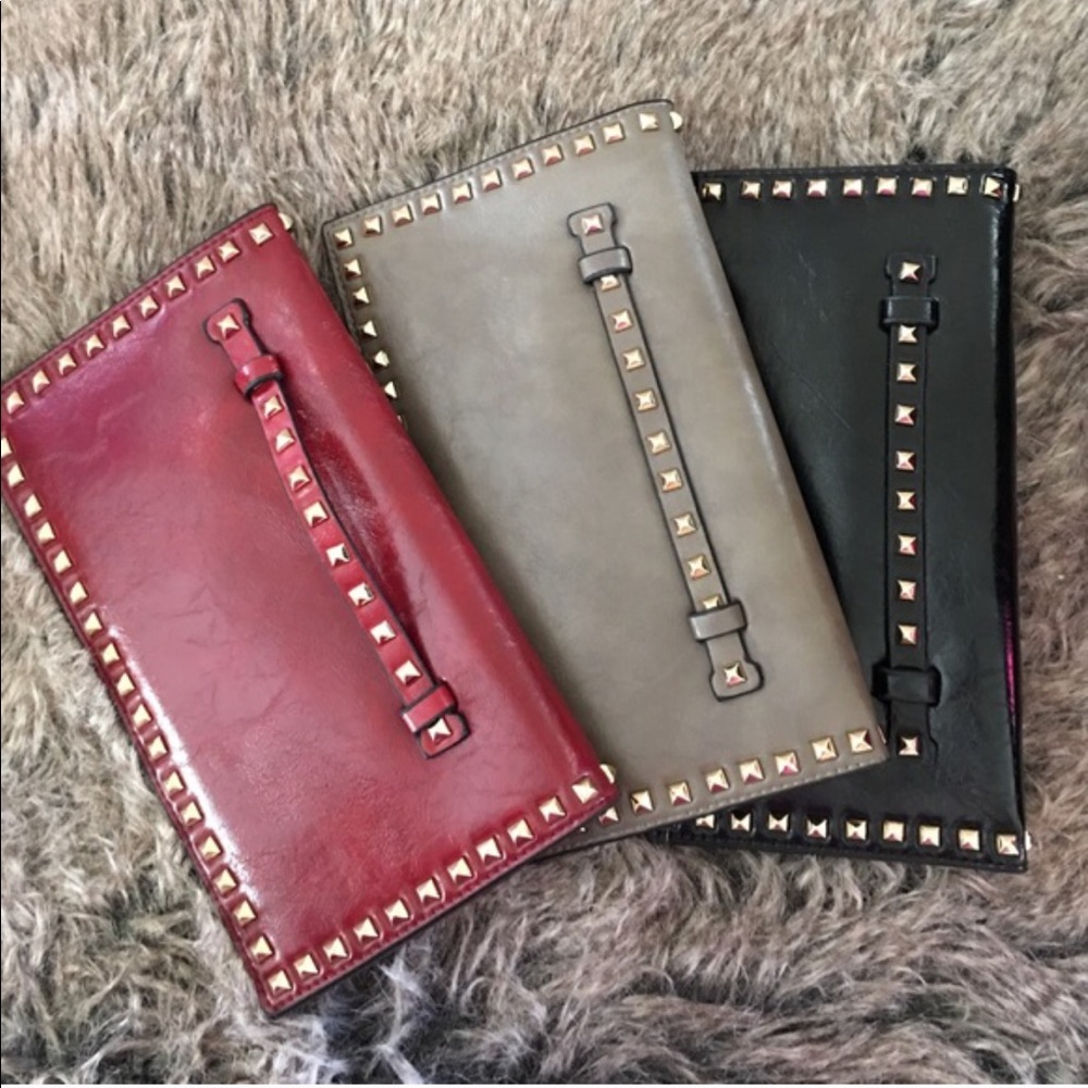 Gray studded clutch