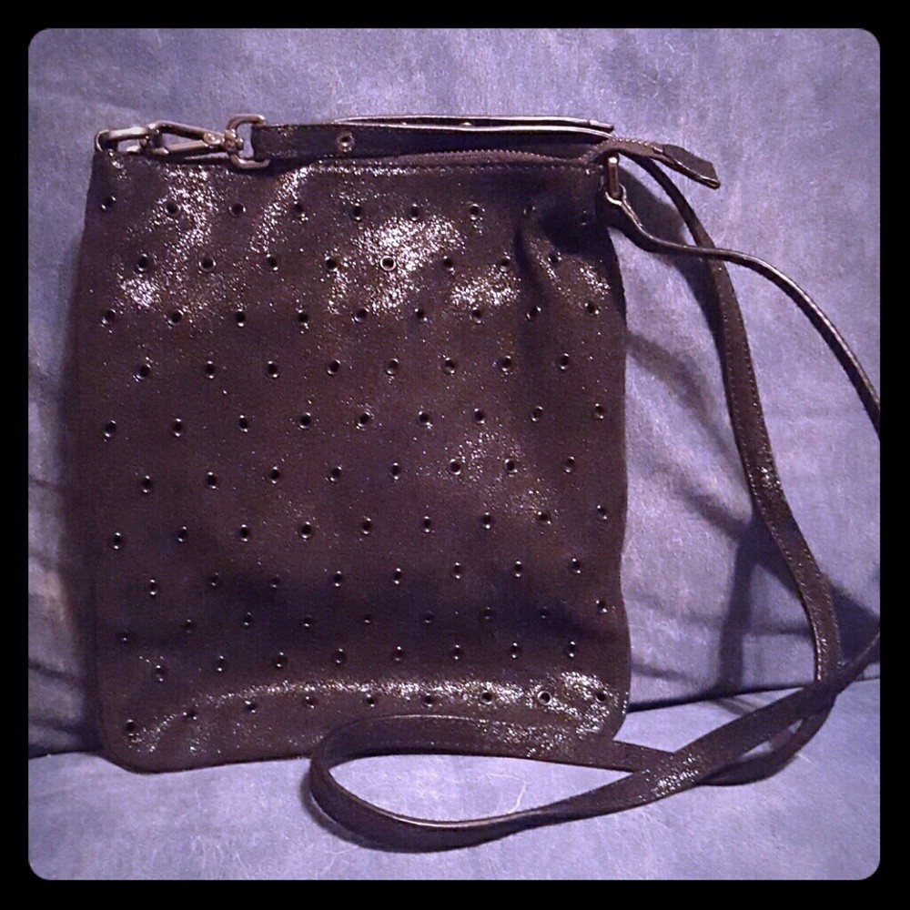 Black Crossbody with grommets as decorations
