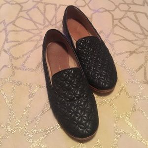 Black leather loafers
