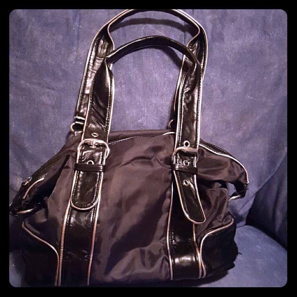Black bag with silver piping.