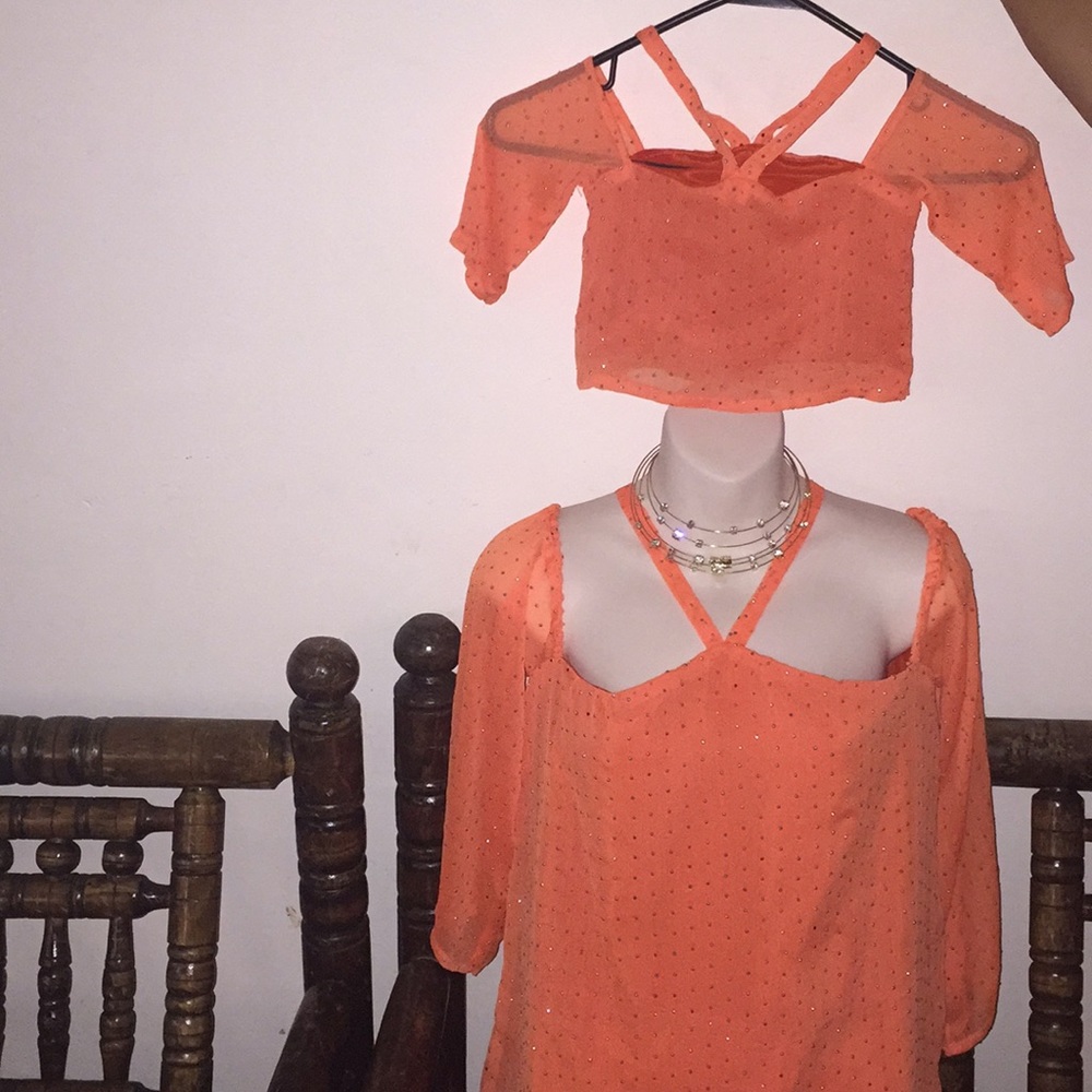 Cute matching mother/daughter embellished tops.
