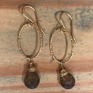 Delicate stone drop earrings with intricate detail