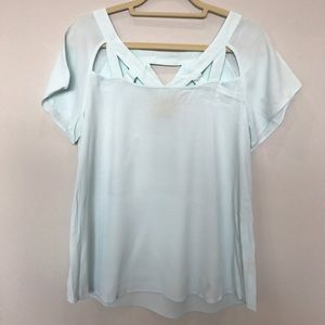 Anthropologie blue cut out blouse