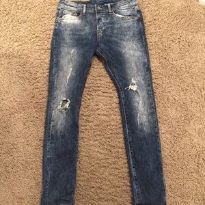 Distressed stone washed jeans