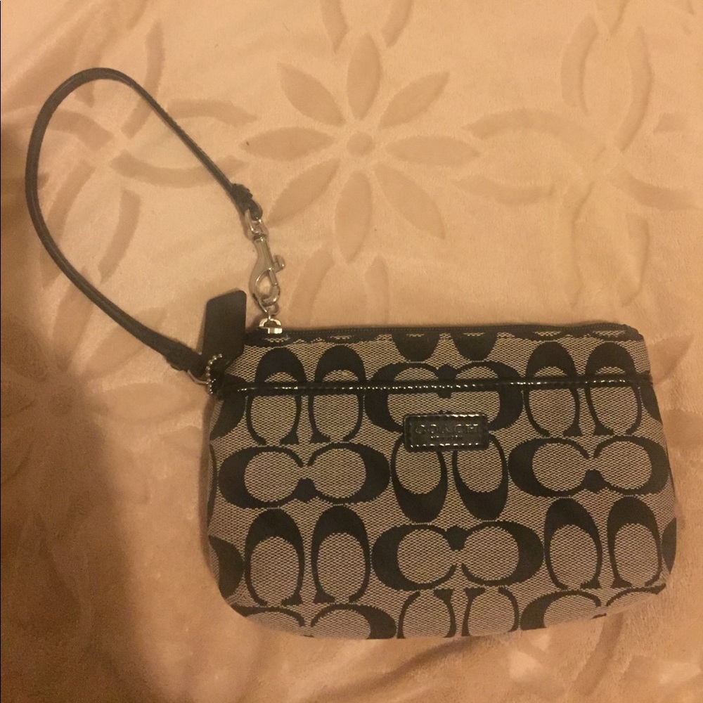 Coach wristlet. **Never been used