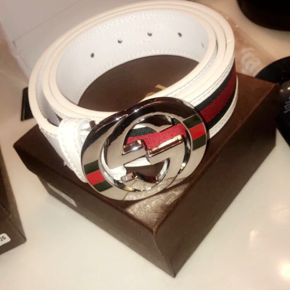 Gucci belts one with flops to match.