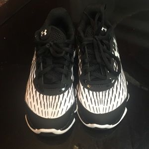Boys under armor tennis shoes still in box