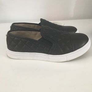 Steve Madden Black Slip Ons