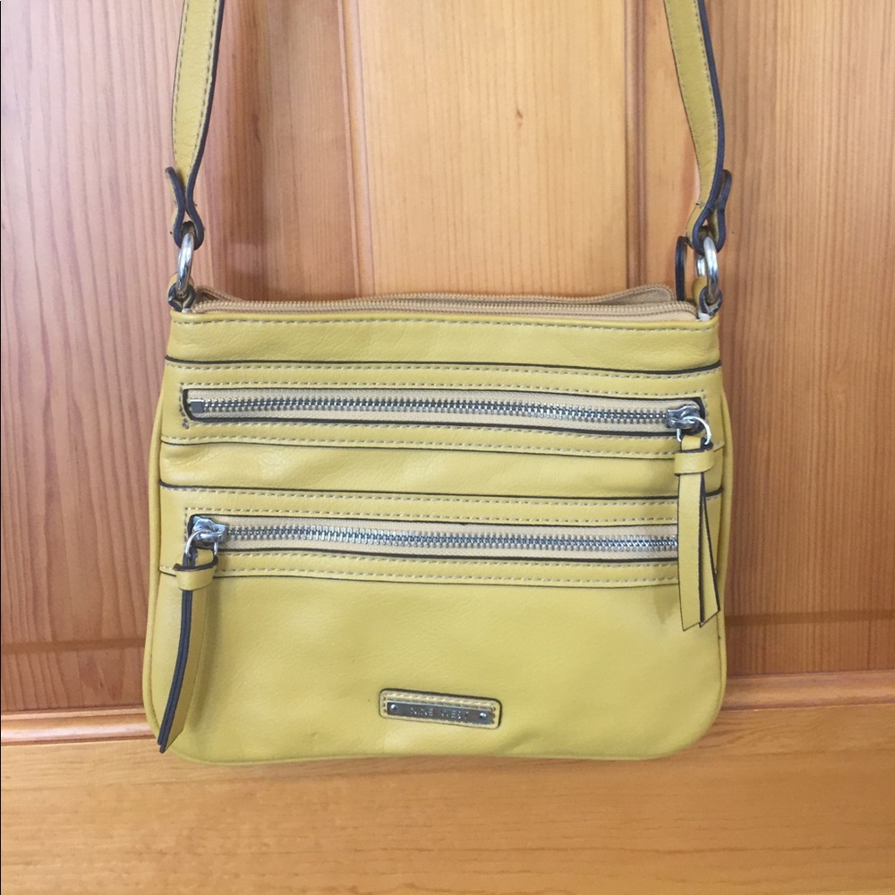 Nine West mustard colored cross body purse