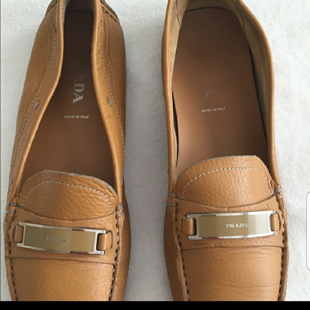 Prada tan shoes.