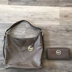 Authentic Greige Michael Kors handbag and wallet.