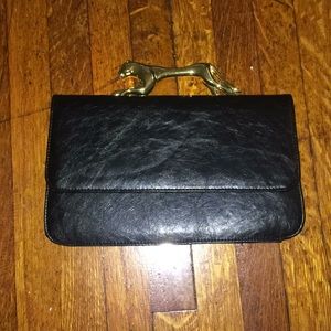 Black clutch w gold panther detail
