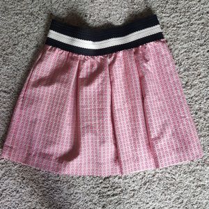 Mid thigh, high waisted skirt