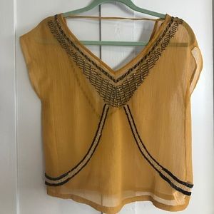 Ecoté shirt with beading and open back detail