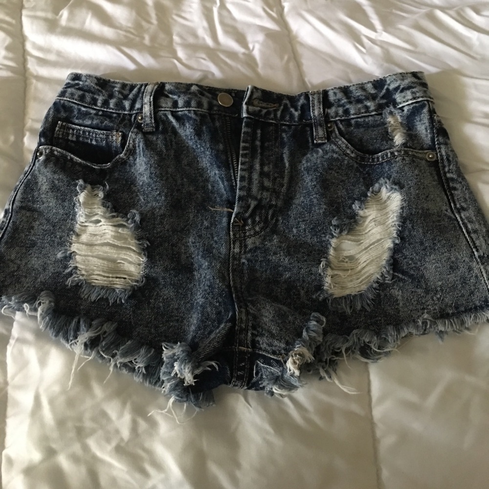 High wasted distressed shorts.