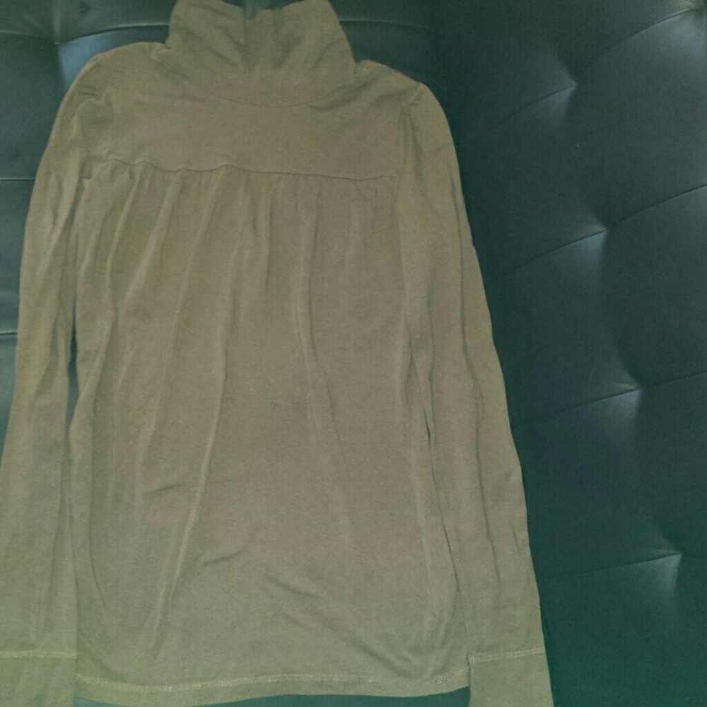 Brown form-fitting turtleneck