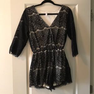 EUC Black/Cream Romper with 3/4 length sleeves