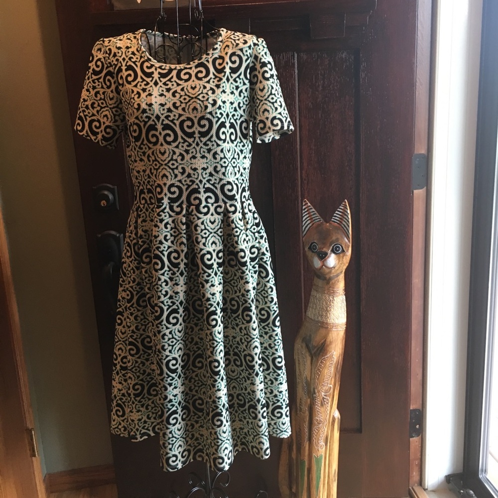 Gorgeous LuLaRoe Amelia in teal, black, and ivory!