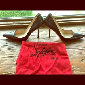 Christian Louboutin black leather heels Paris