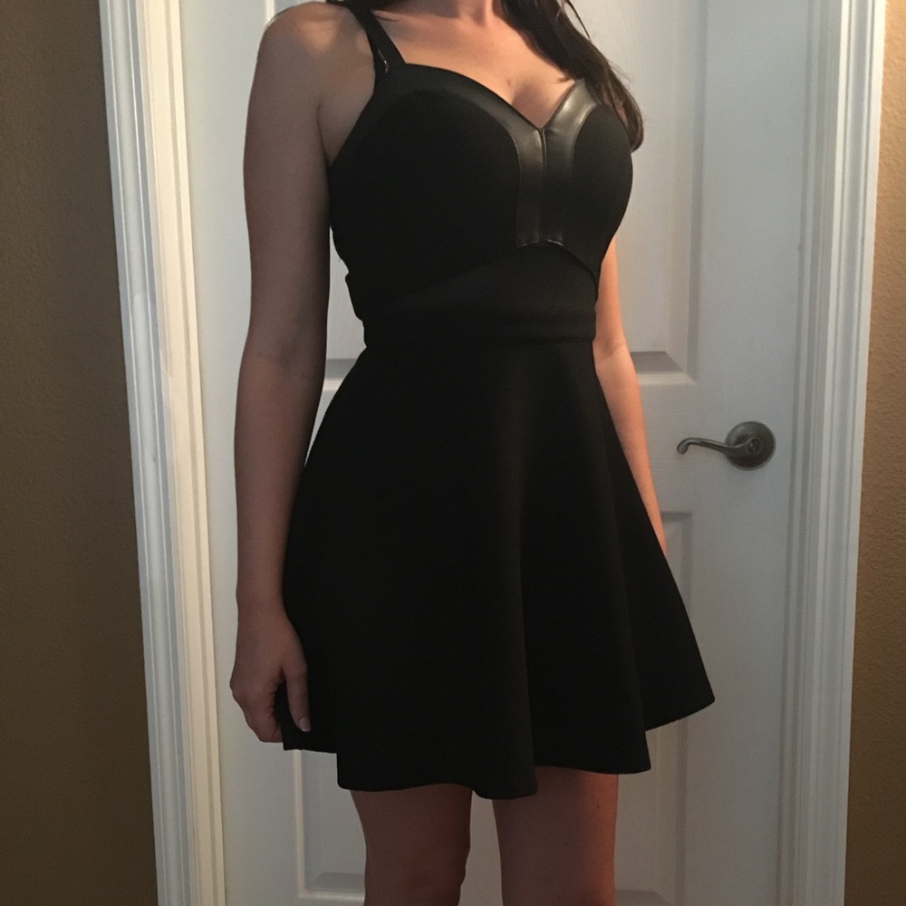 Black Bebe dress with leather straps xs fits s