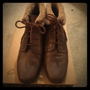 Lace up leather booties with faux fur lining