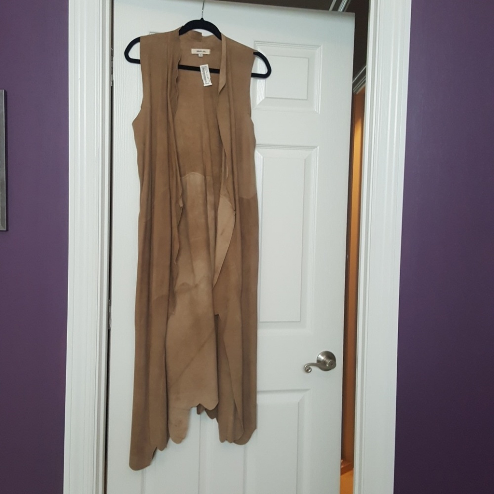 100% genuine leather full length vest.