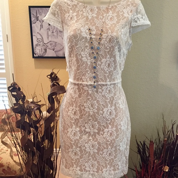 bebe Dresses & Skirts - Classy Bebe Lace Dress with Crisscross Back