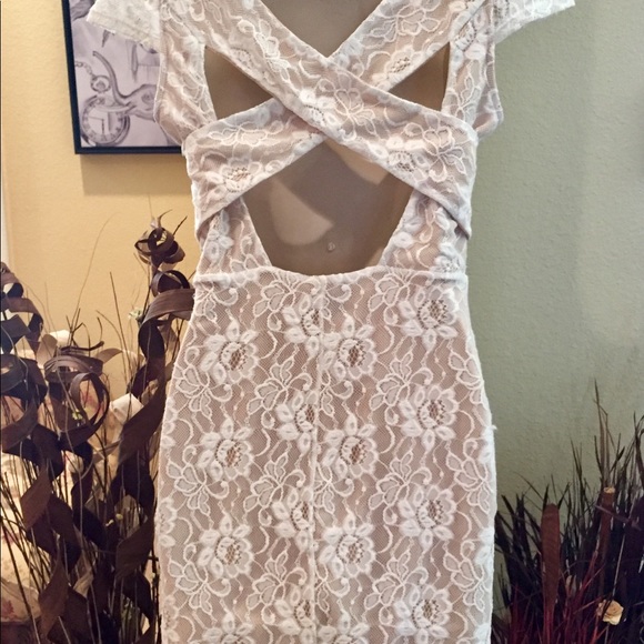 Classy Bebe Lace Dress with Crisscross Back - Picture 2 of 5