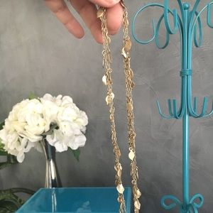 Gold leaf chain necklace.