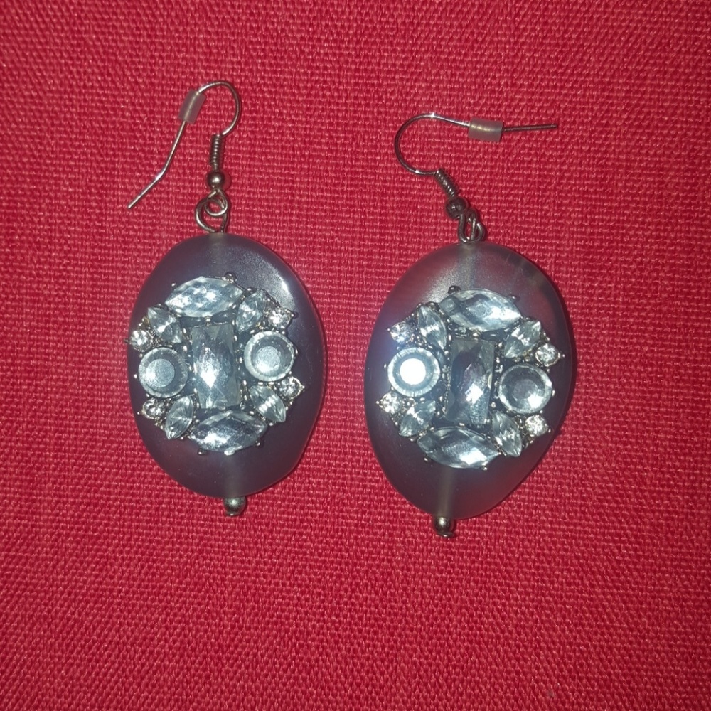 Gray stone and jeweled earrings