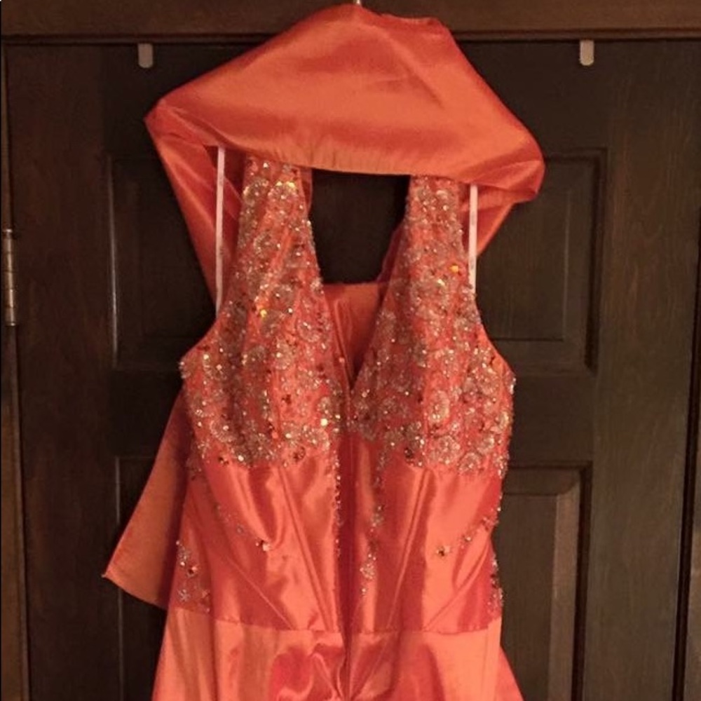 Crushed orange gown.