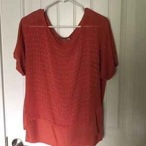 Orange blouse with with silver medal balls!