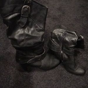 Women's size 8.5 leather boots.