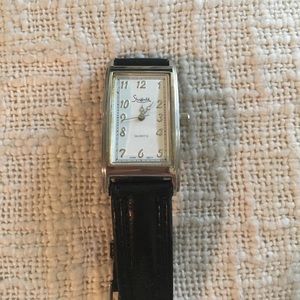 Ladies Watch ⌚️ with silver face and black band