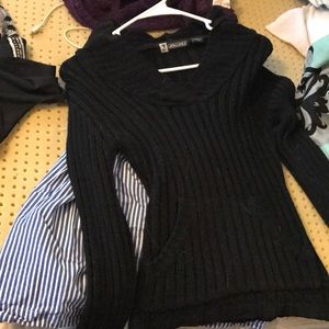 Black form fitting sweater