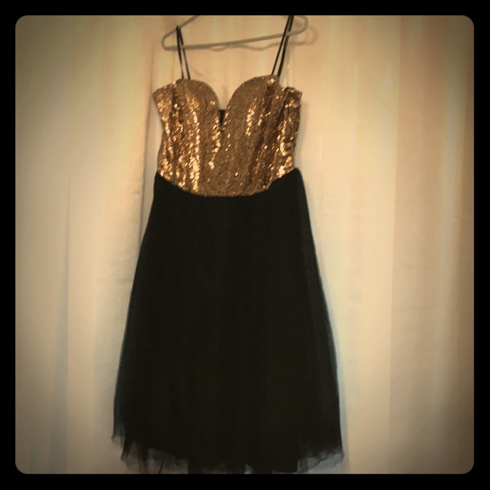 Black and gold sequins dress