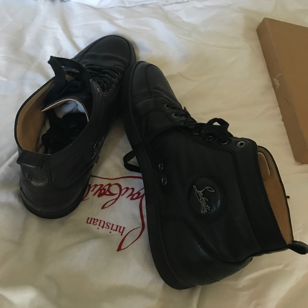 Authentic men's Christian Louboutin black boot.