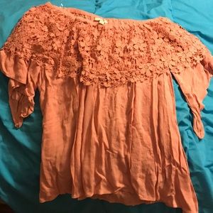 Never worn off the shoulder shirt.