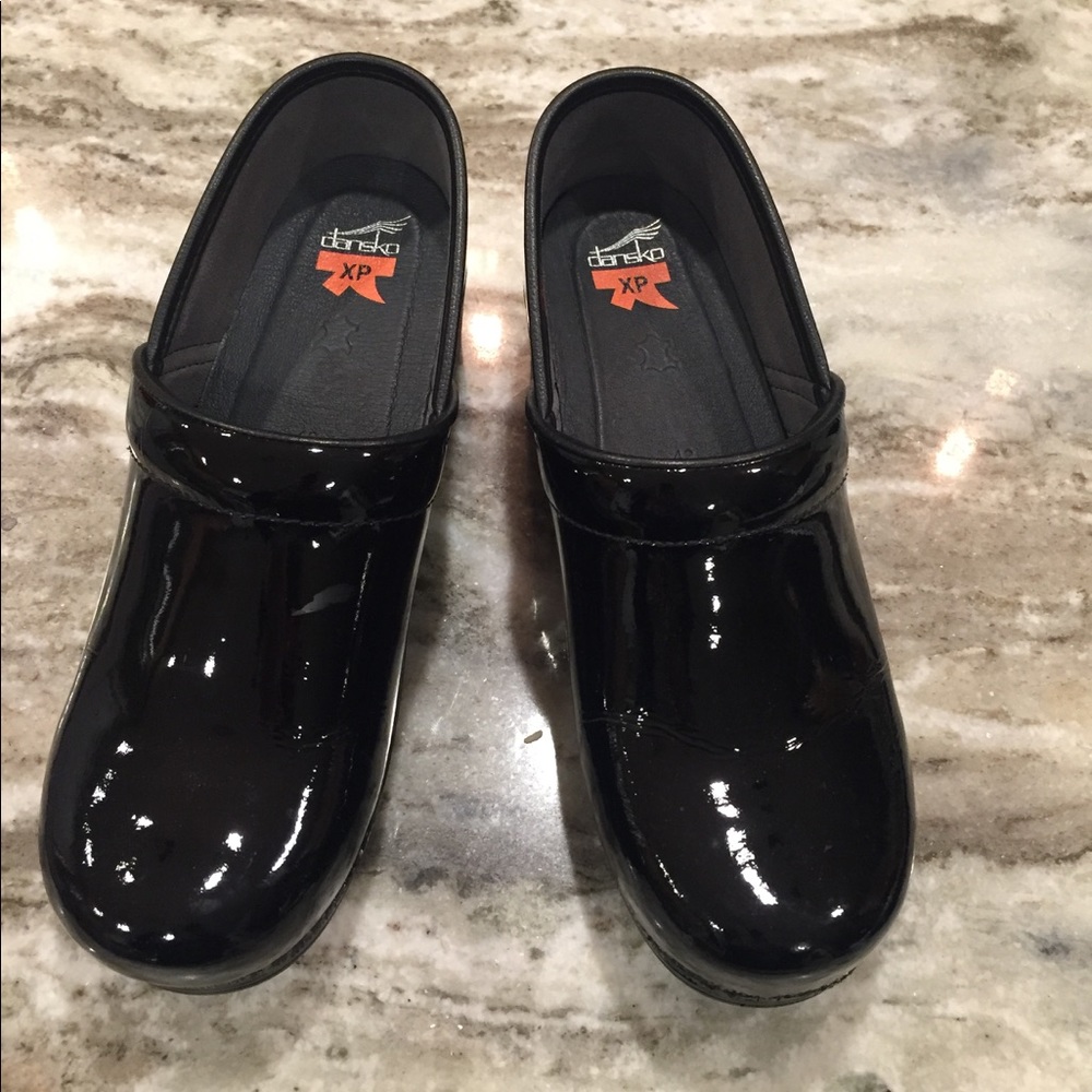 Dansko shiny black clogs
