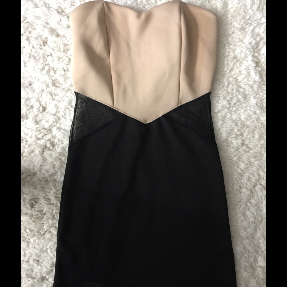 Tube dress with sheer cutoff on sides